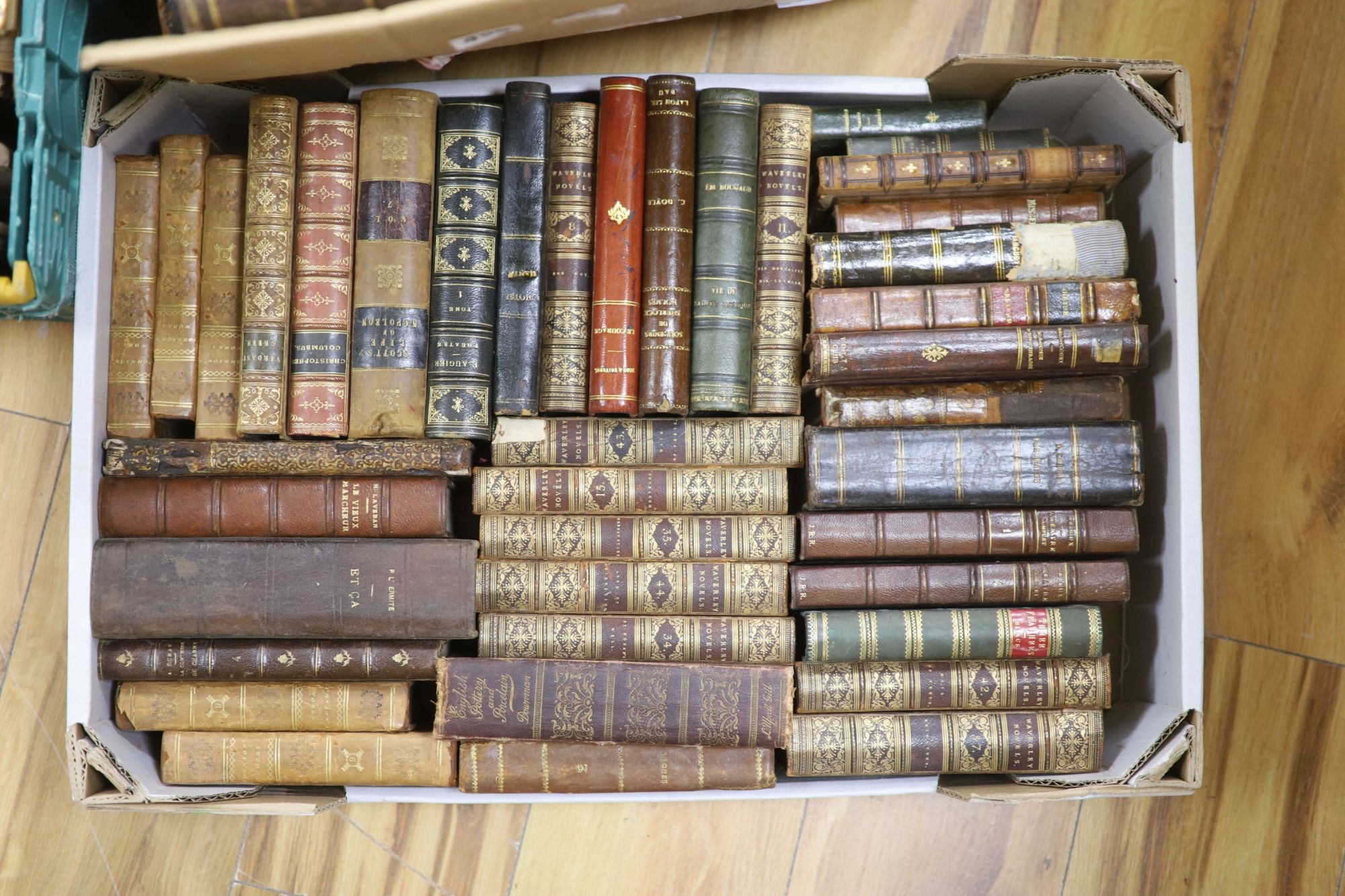 Three boxes of various decorative bindings